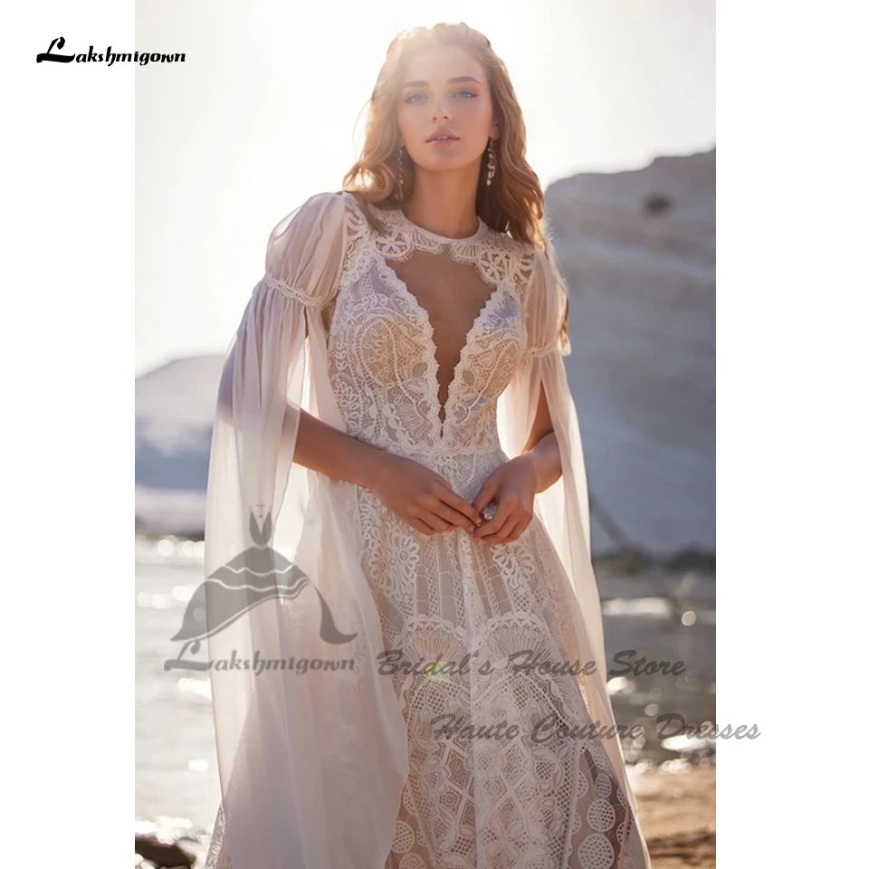 Robe de mariée bohème en tulle, dentelle et col V - CLEVI Paris