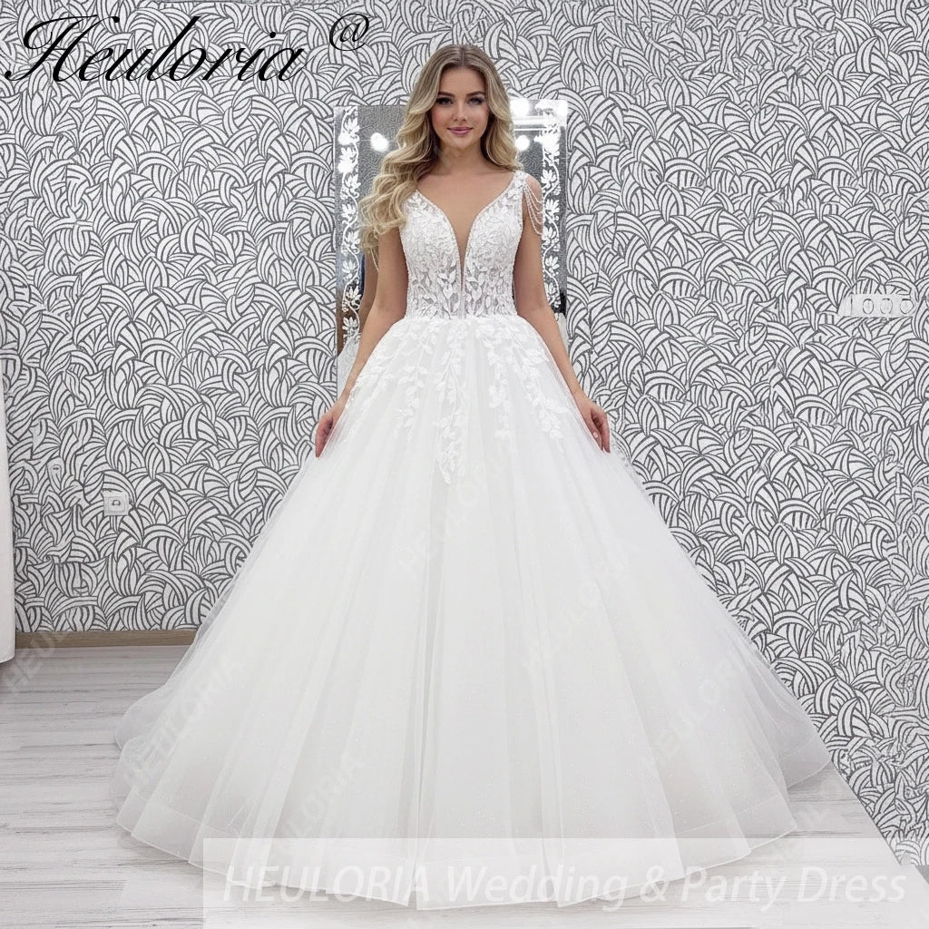 Robe de mariée ligne A en dentelle col en V – CLEVI Paris