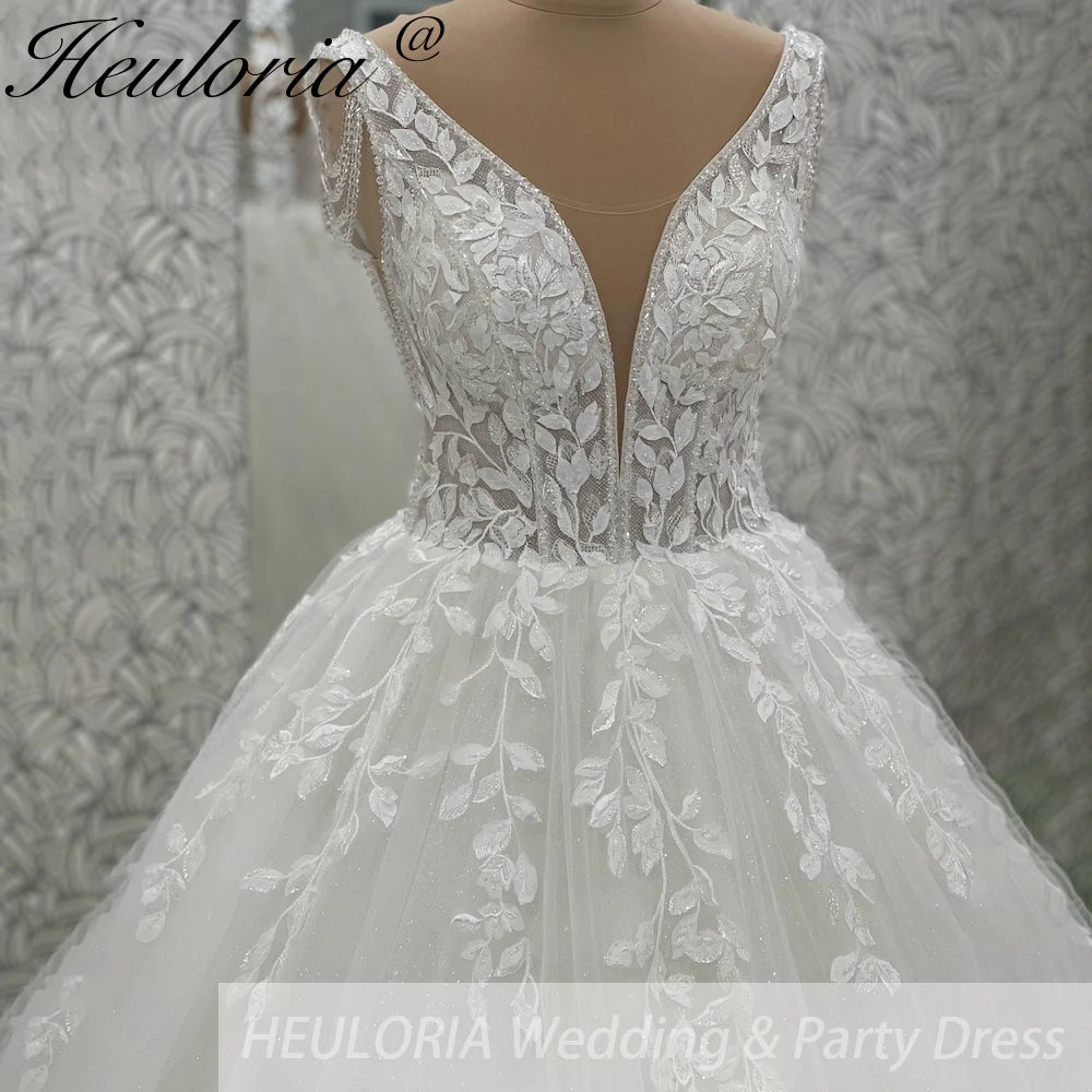 Robe de mariée ligne A en dentelle à perles – CLEVI Paris