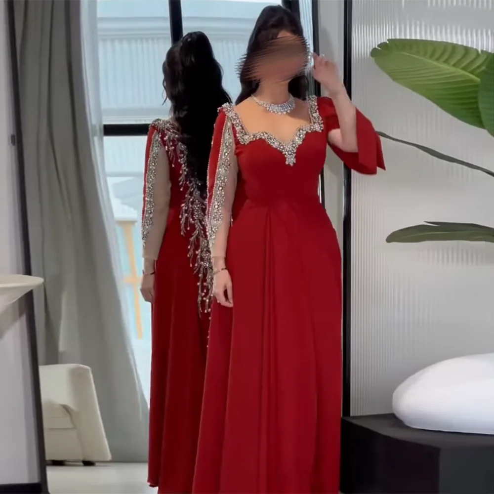 Robe de soirée longue perlée col cœur – CLEVI Paris